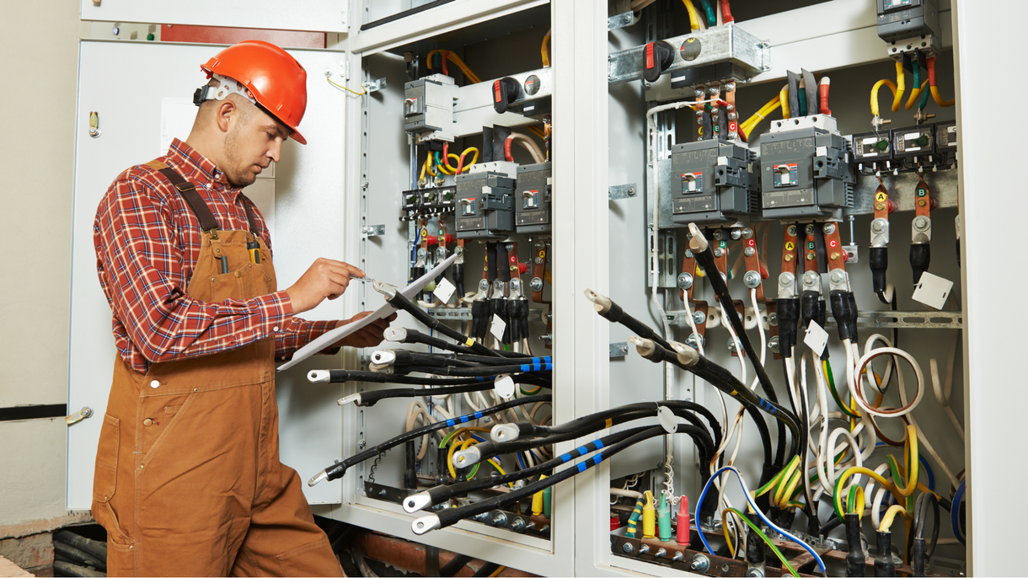 electrician testing a panel
